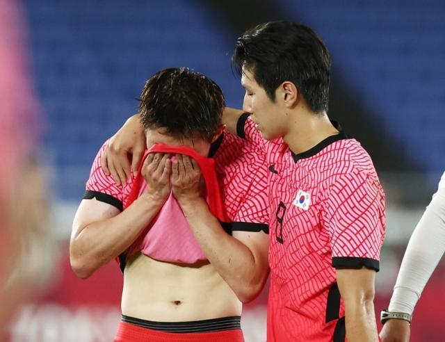 日本球队惨遭淘汰,球迷沮丧不已的简单介绍 日本球队惨遭淘汰,球迷沮丧不已的简单介绍